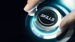 man turning a skills dial