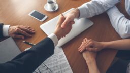 property agent and client shaking hands