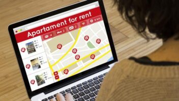 Woman Looking at Home Rental Listings