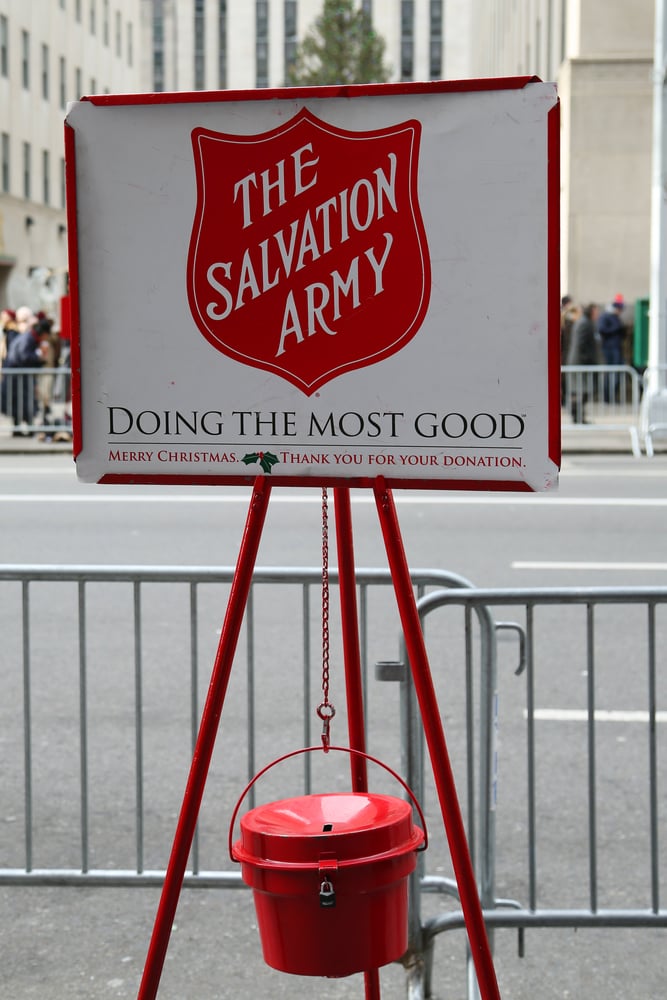 Salvation army donation drive bucket with sign