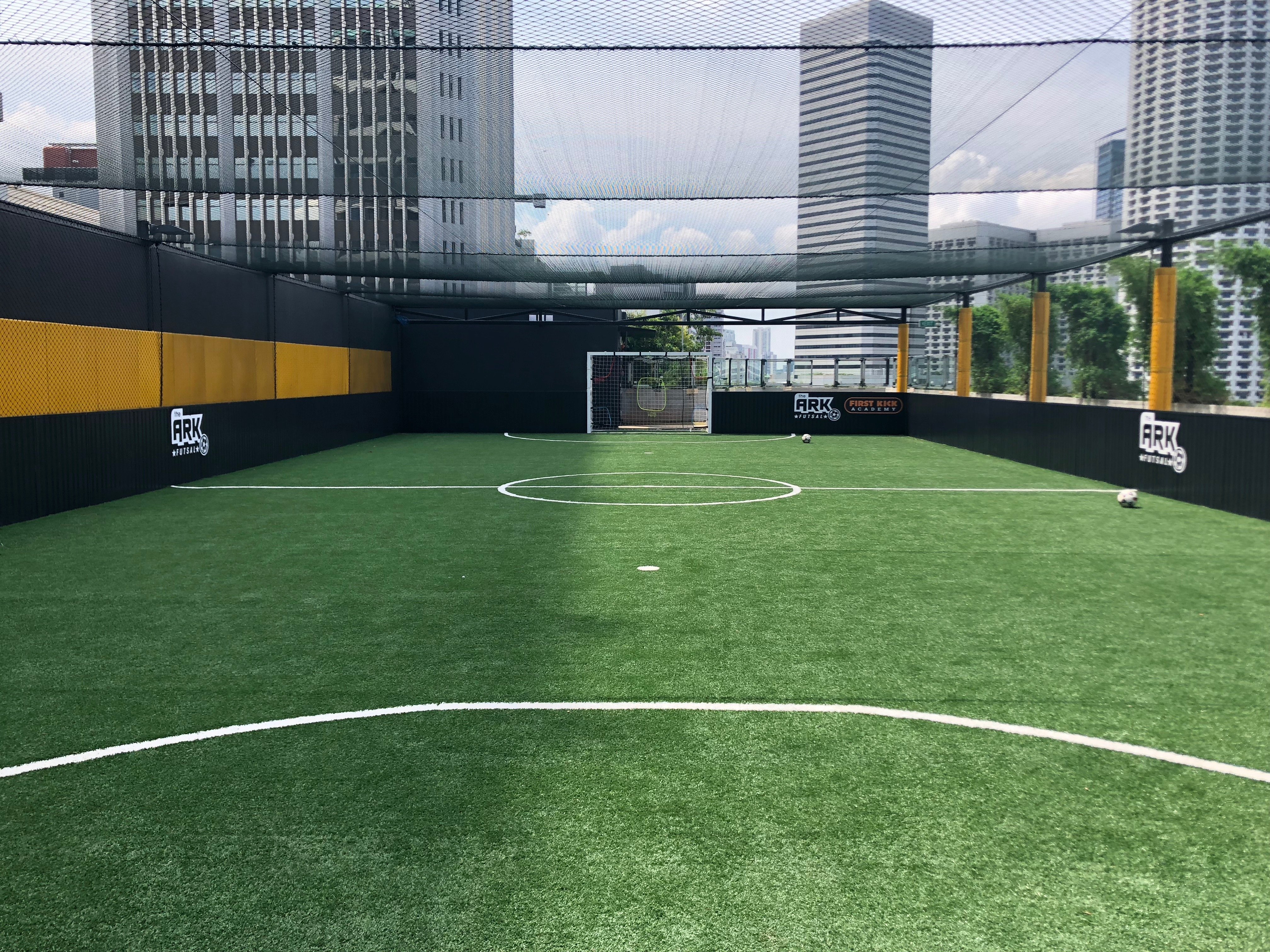 The rooftop futsal court.