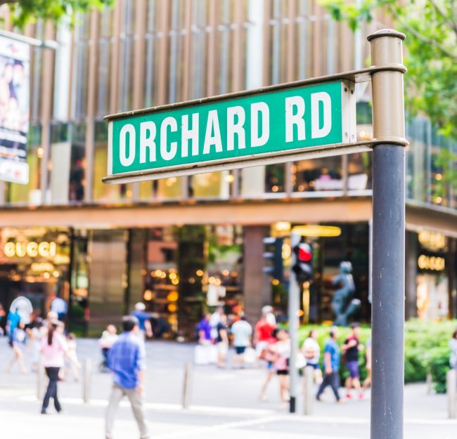 A signboard showing "Orchard Road".