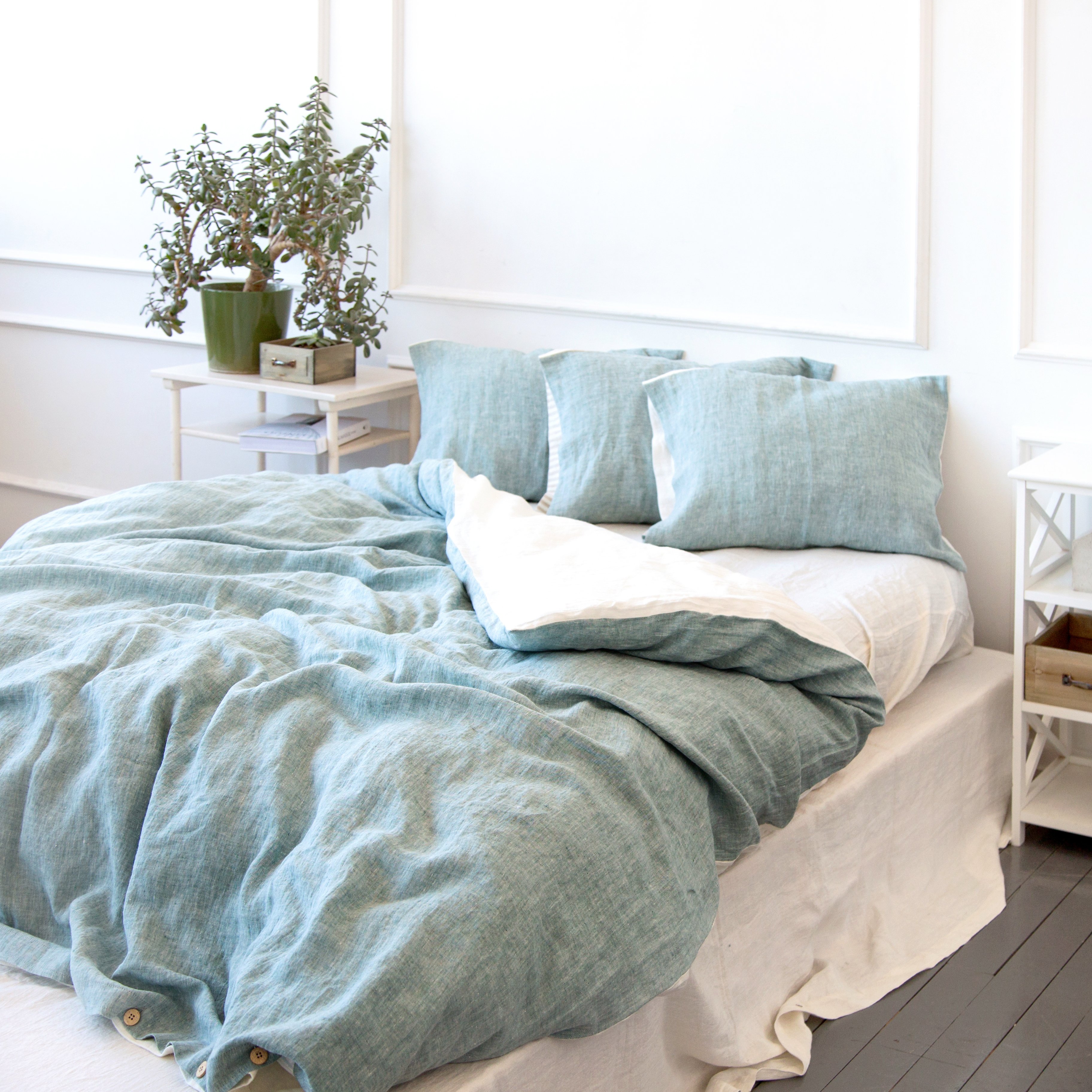 bed with comforter and pillows