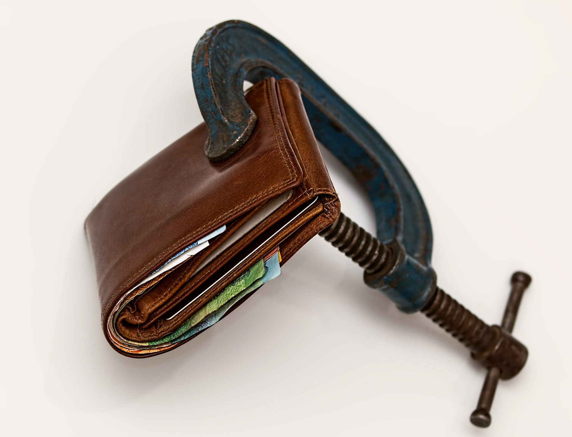 Wallet being squeezed