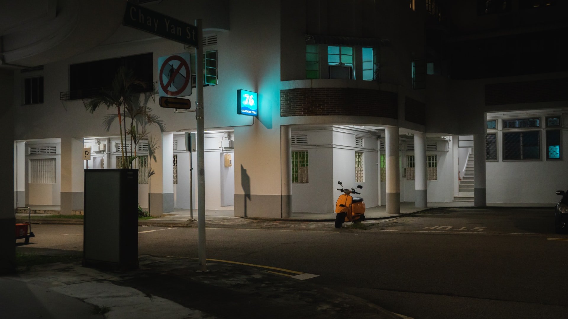 Motorcycle parked at an HDB car park