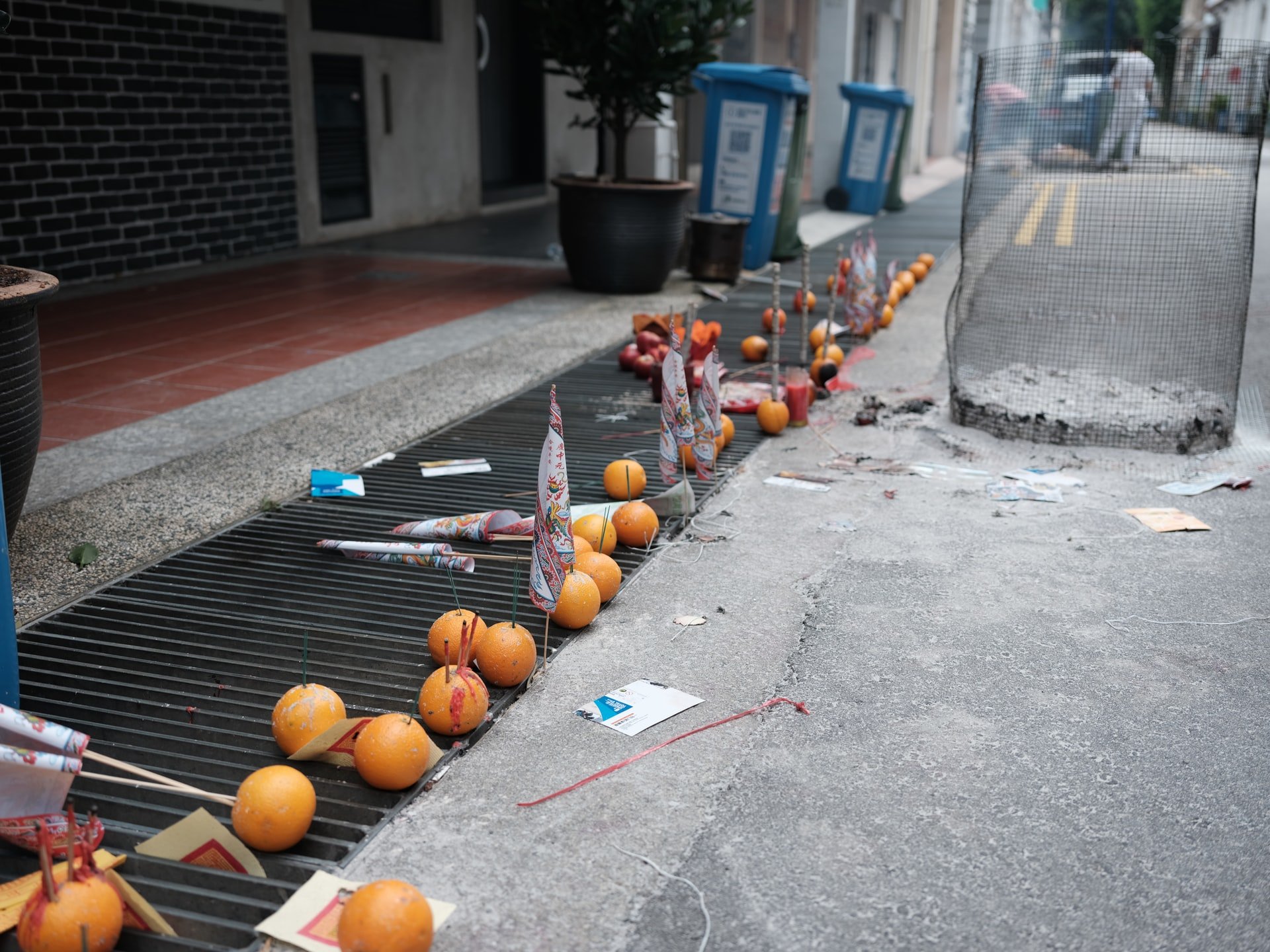 Offerings on the pedestrian walkway during Hungry Ghost Festival