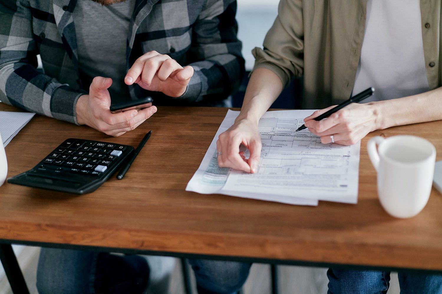 couple calculating finances