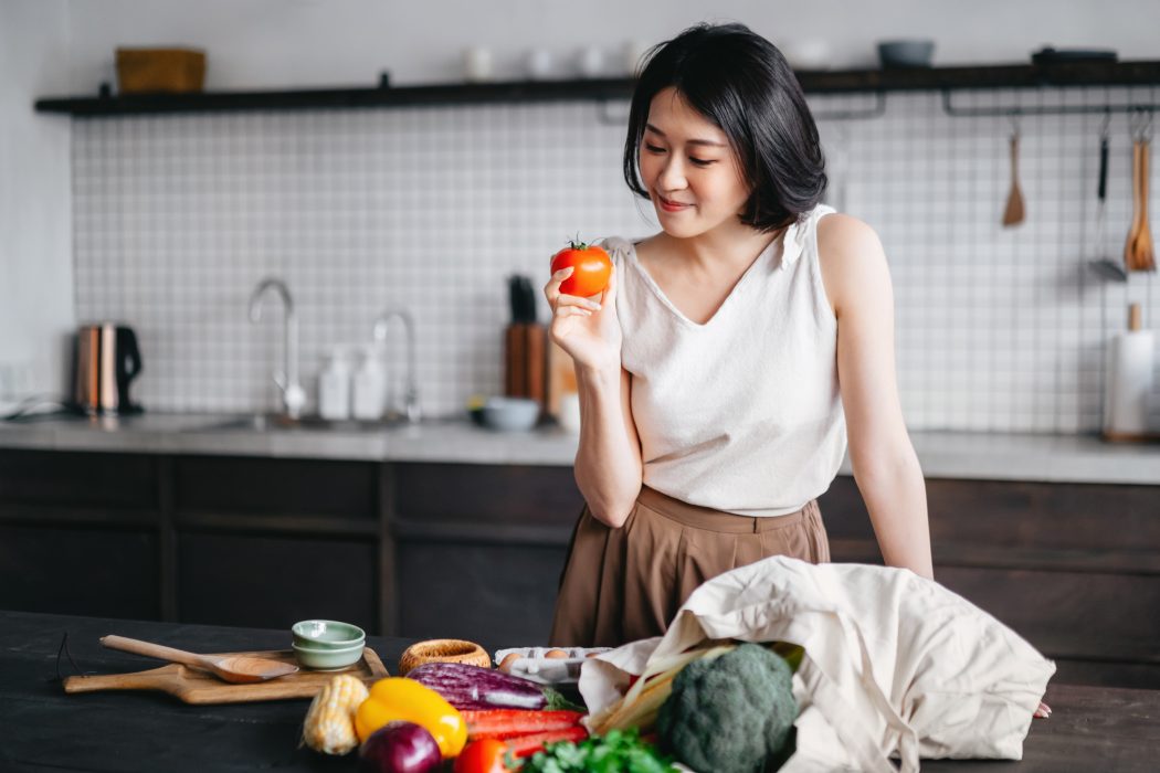 Young woman in kitchen