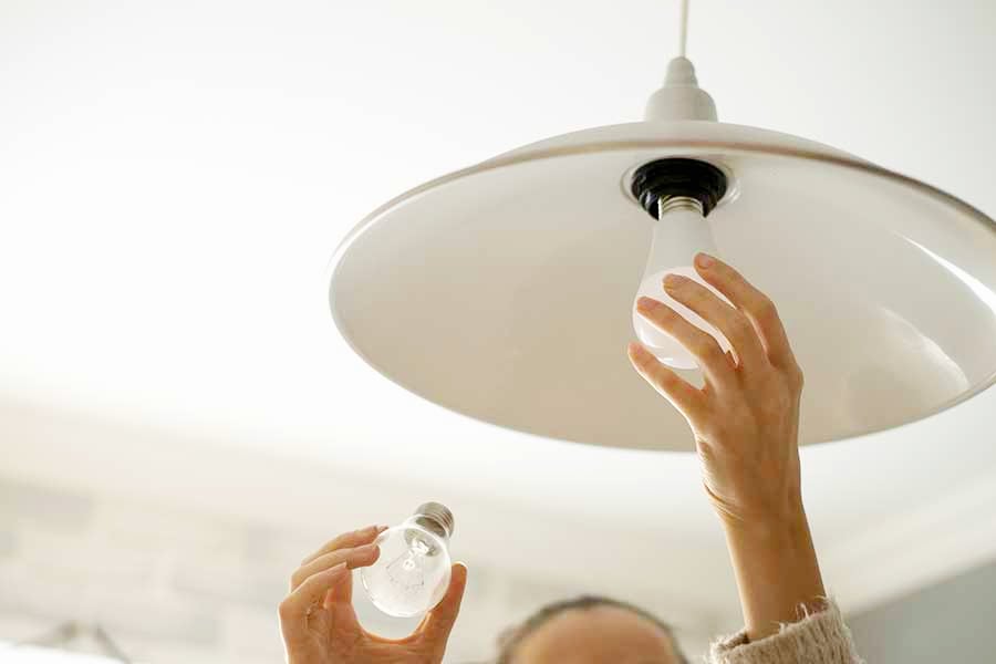 changing light bulb