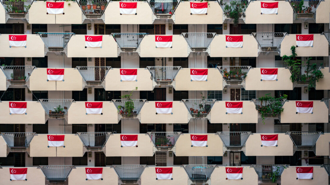 HDB block with Singapore flags during NationaL Day period