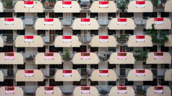 HDB block with Singapore flags during NationaL Day period