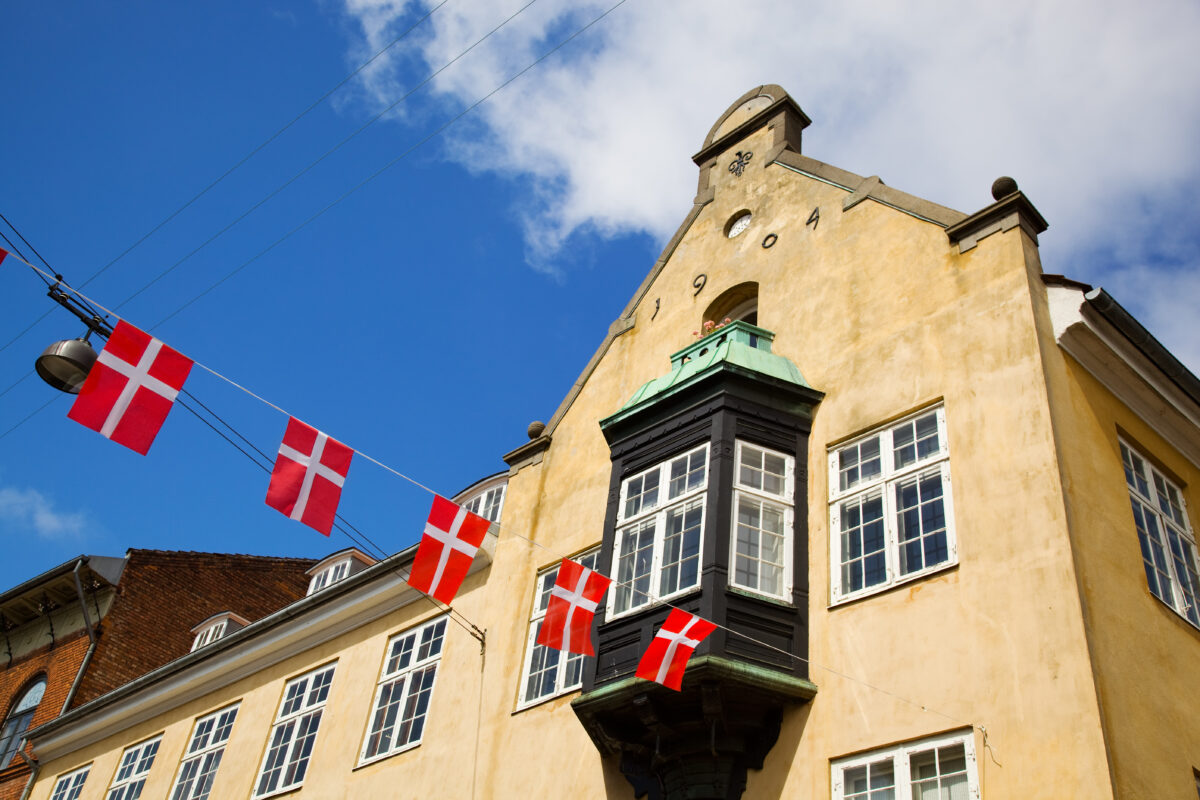 Danish,Flags,And,An,Old,Apartment,House