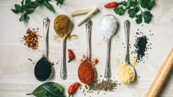 A group of spoons filled with spices