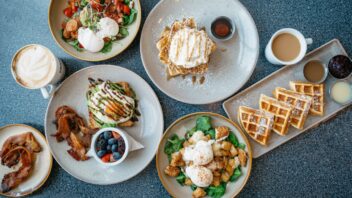 A table with plates of food.