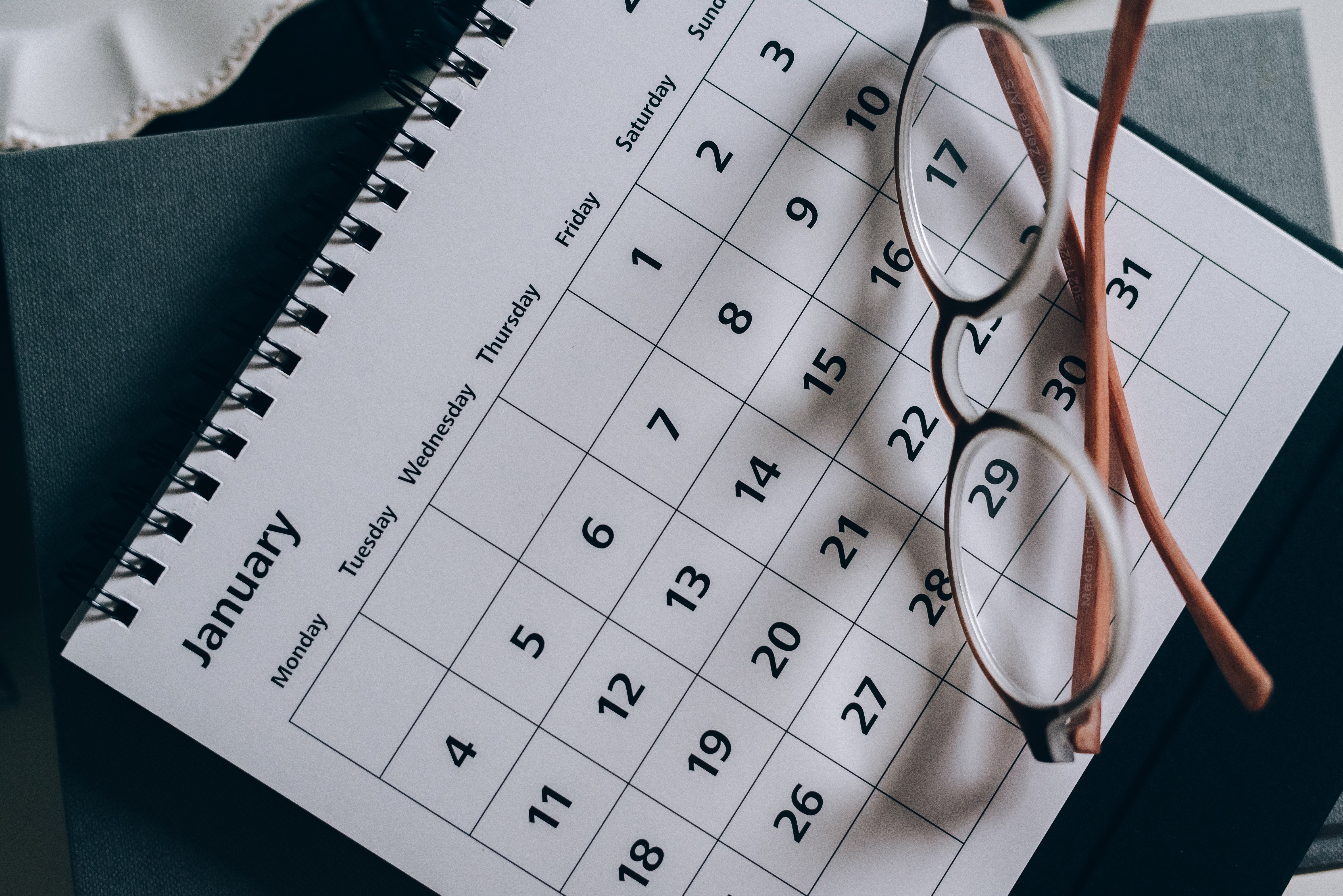 A calendar with glasses on it