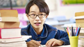 young boy in classroom
