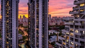 High angle view of private property buildings against sky during sunset in singapore