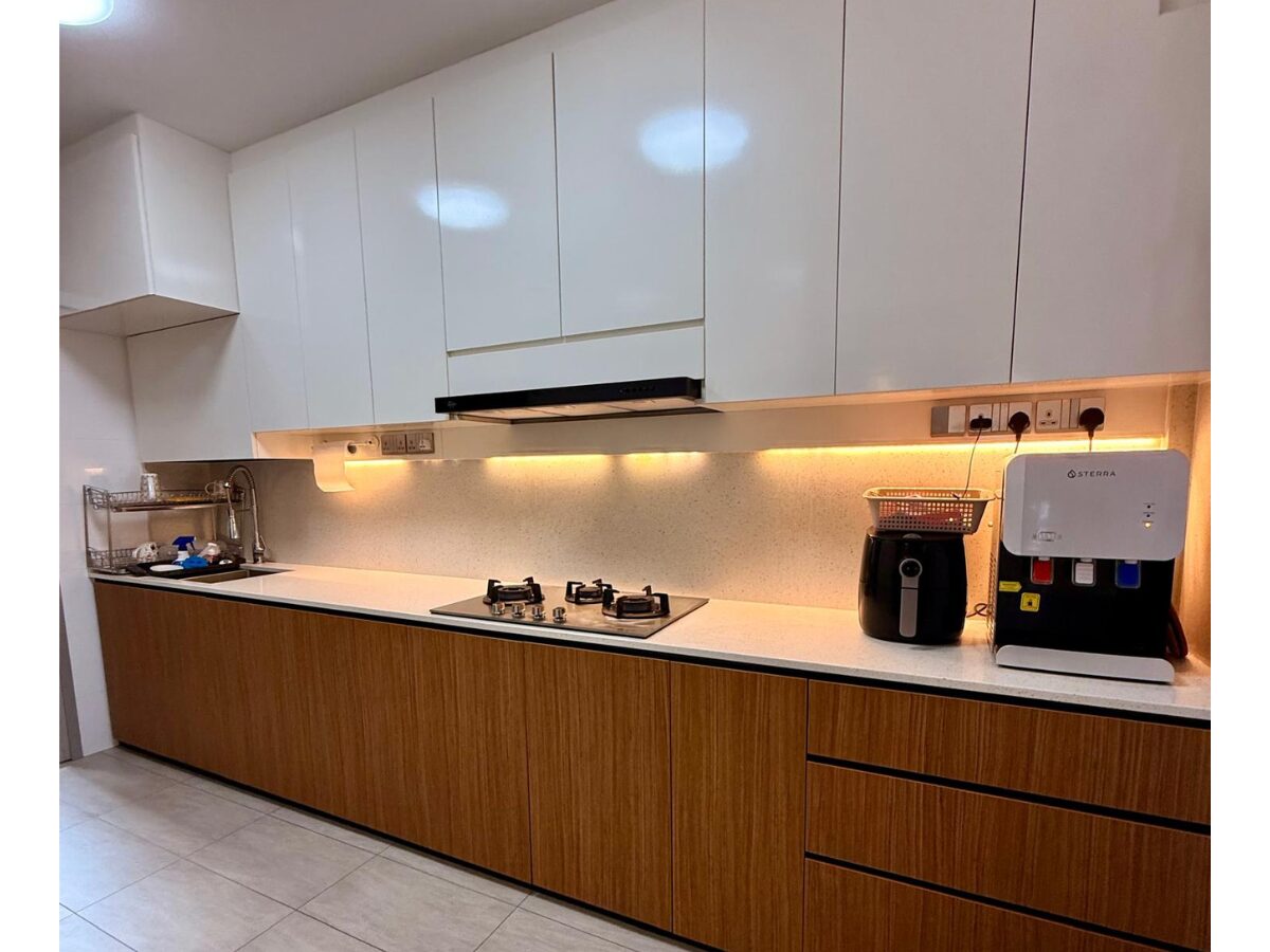 the renovated kitchen of the just mop-ed tampines greenbloom 5-roo flat for sale