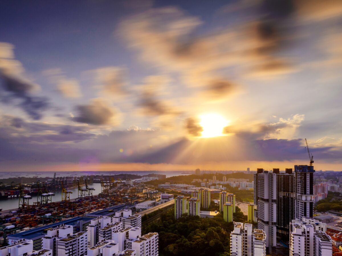 Panoramic view of Singapore skyline business building and Singapore port Tanjong Pagar Terminal during sunset