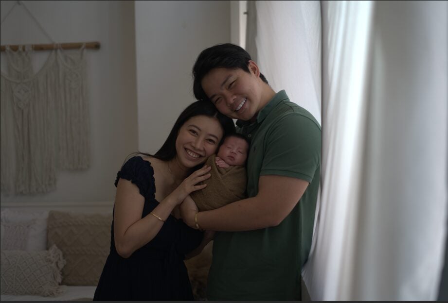 jayson and chalene with their newborn child